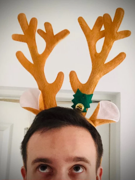 Photo of Jakub Łyskawka in a reindeer antler headband